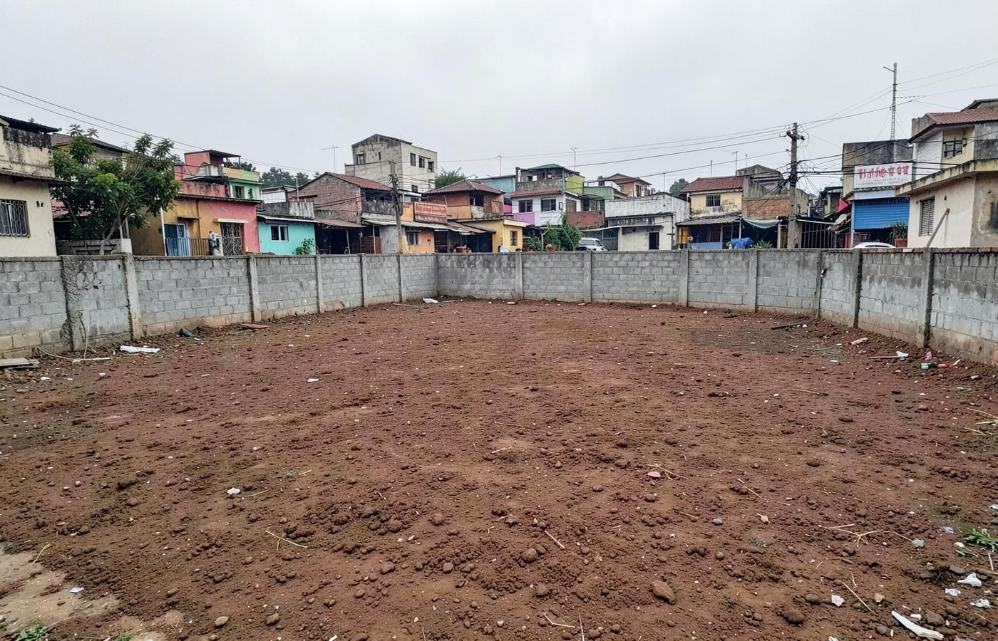 Cleared and levelled empty plot after building demolition and debris removal